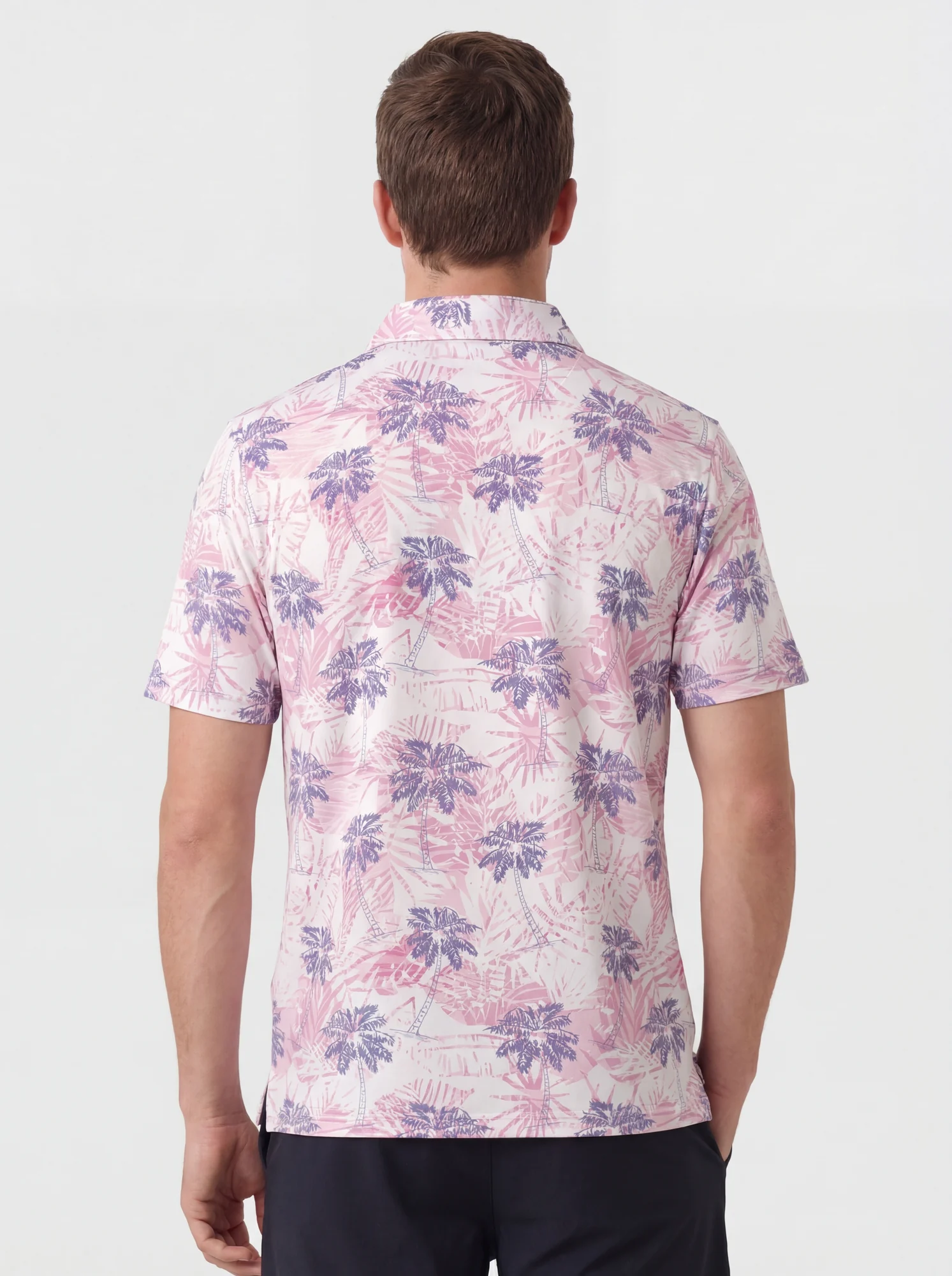Men's pink & purple palm print polo in pink / purple, back view
