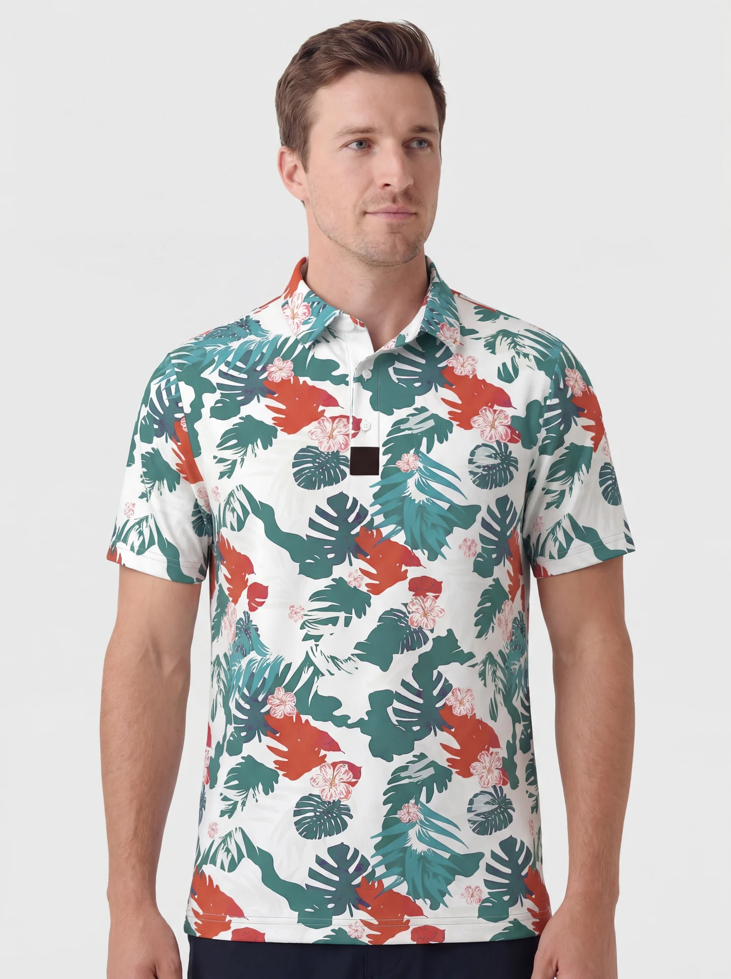 Men's green leaf & red floral polo in white / green / red, front view