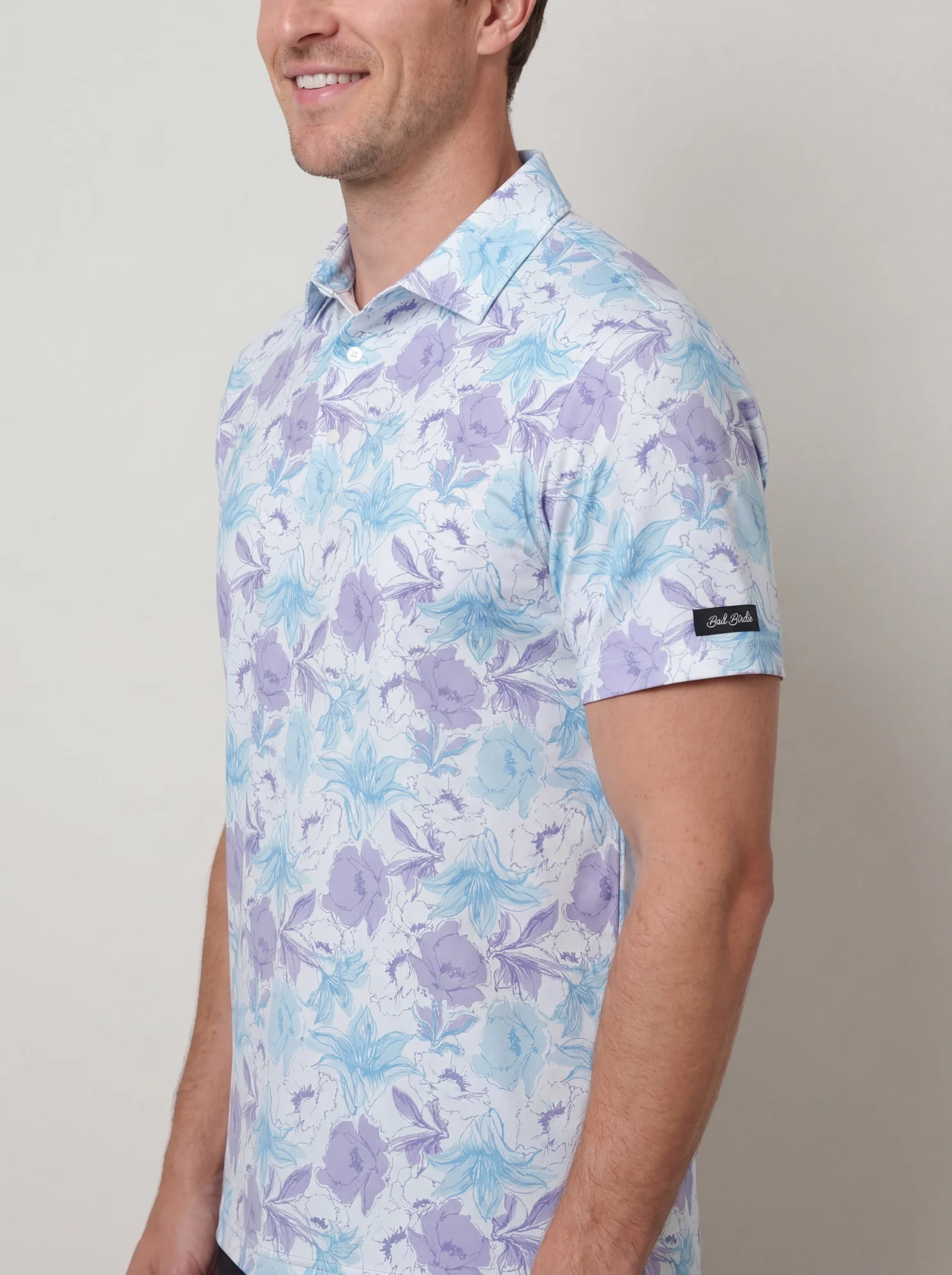 Men's aqua & lilac botanical polo in white / aqua / lilac, shoulder and collar detail view