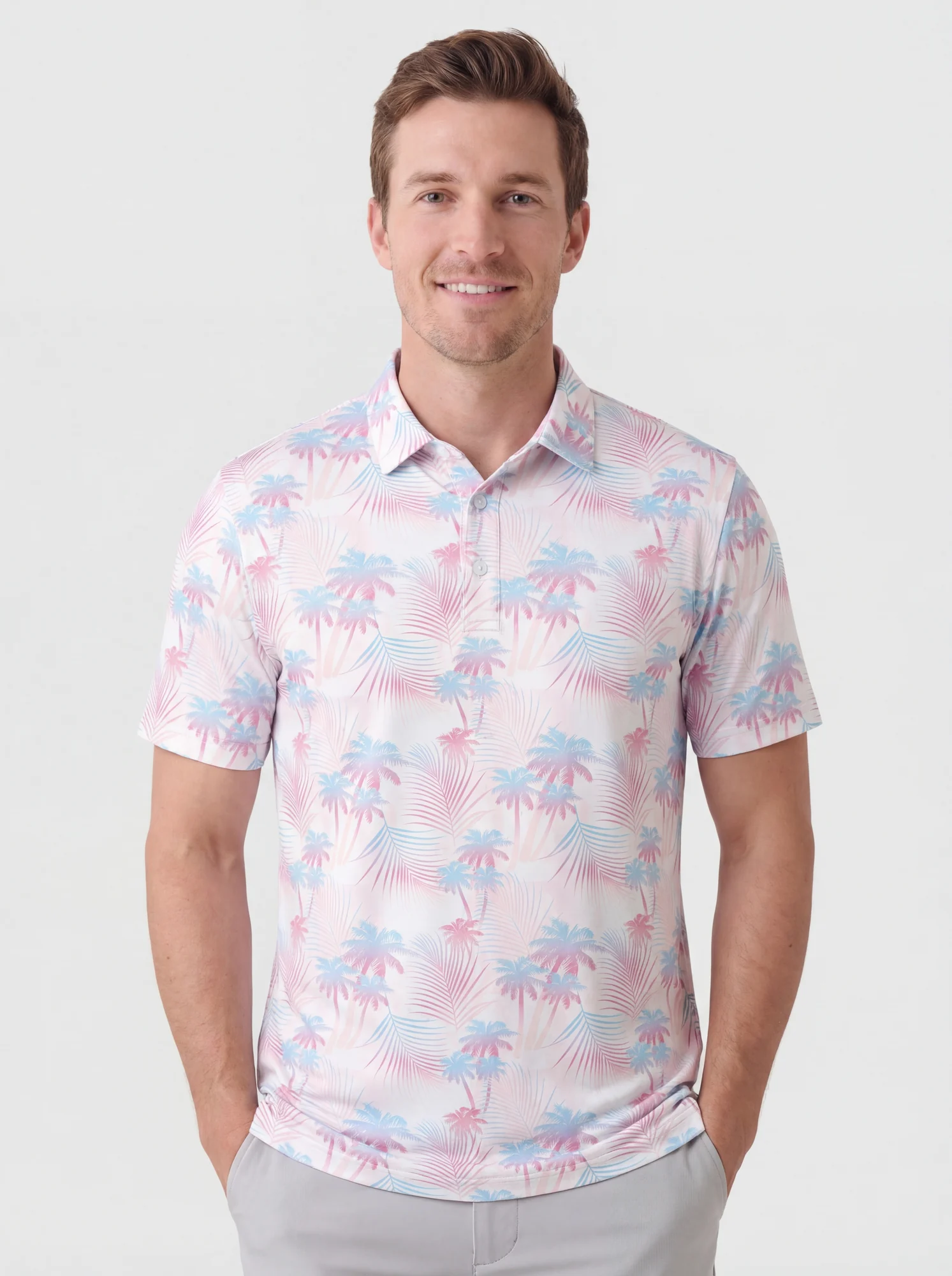 Men's pastel pink & blue palm print polo in white / pink / light blue, front view