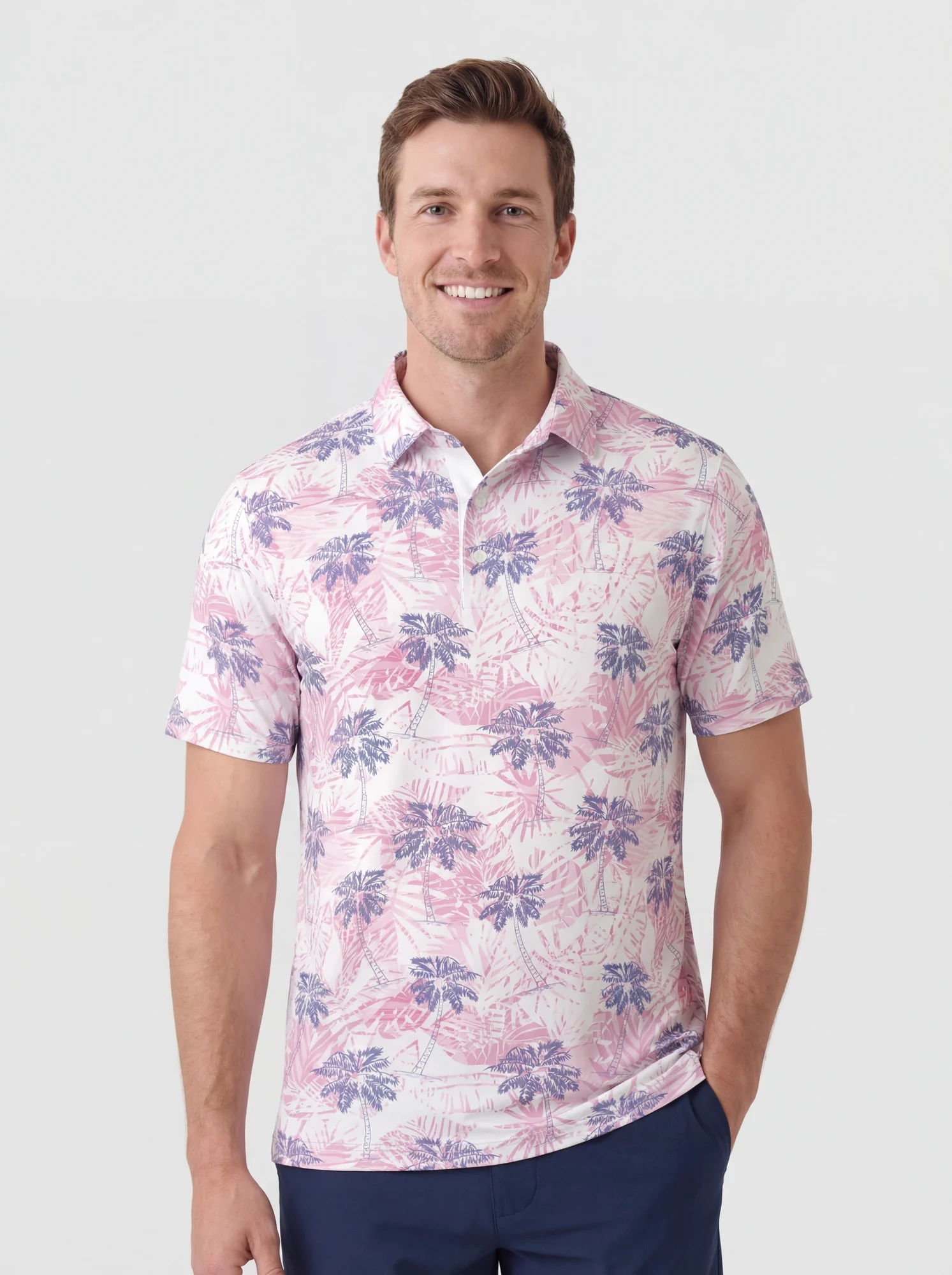 Men's pink & purple palm print polo in pink / purple, front view