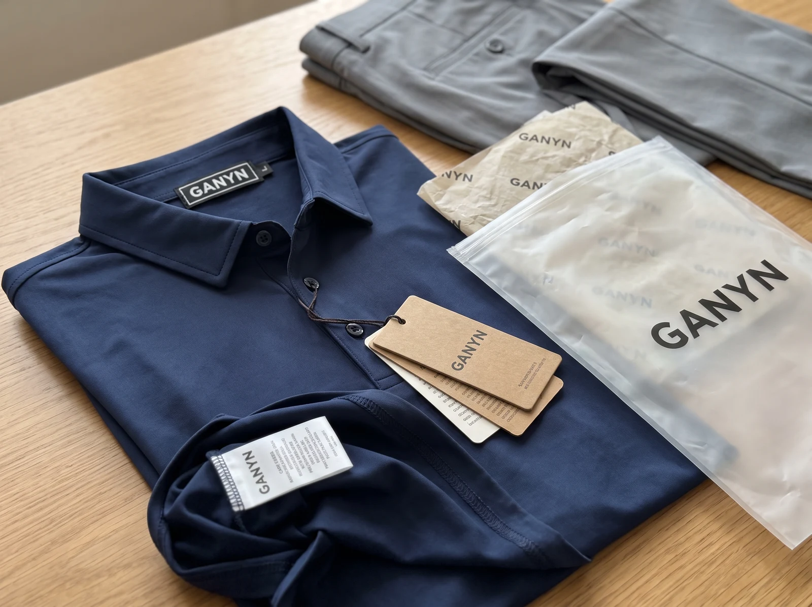 Private-label golf apparel: labels and packaging to specify.