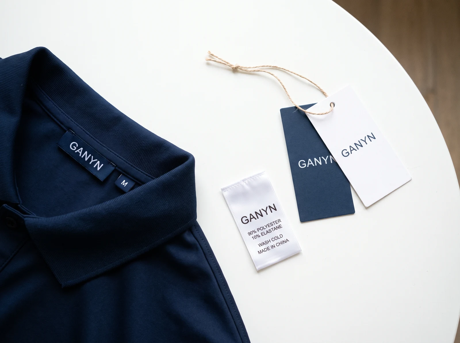 Custom Ganyn woven neck label, size tab, printed care label and branded hangtags